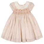 The Antoinette Baby Girls' and Girls' Isadora Short Sleeve Floral Smocked Dress features a white ruffled collar and decorative smocking on the chest.