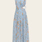 The Otono Navegante Midi Dress by Agua By Agua Bendita is a sleeveless light blue floral dress featuring an A-line skirt, side ruching, and a waist cut-out.