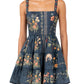 Agua By Agua Bendita Lima Mini Dress in navy blue, a tiered poplin style with a square neckline and a colorful floral and animal print.