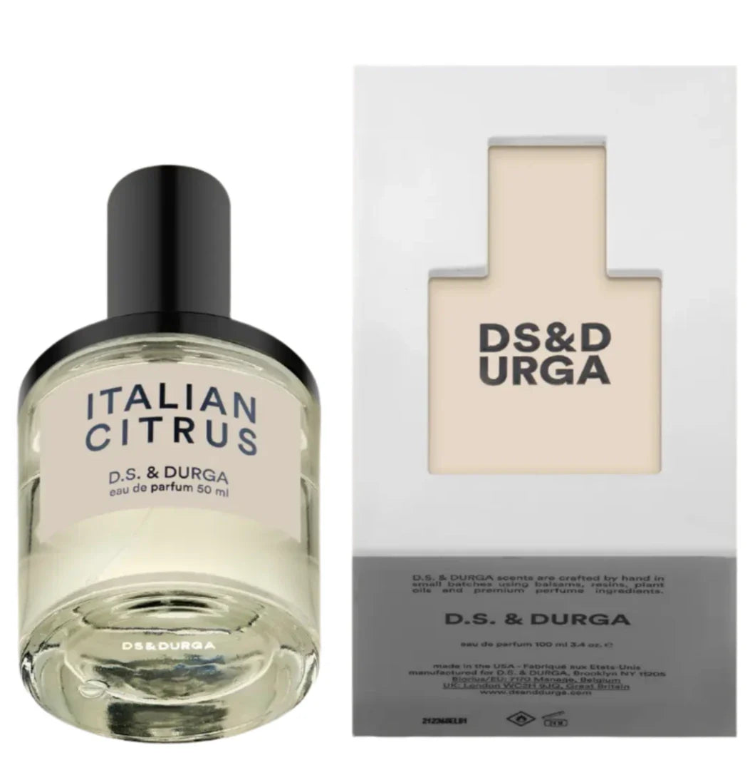 The Italian Citrus 50ML by D.S. & Durga, with its citrus rind essence, sits beside a box adorned with the brand logo.