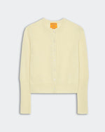 The Jane Cardigan by Guest in Residence is a light yellow, long-sleeve, button-up Jersey Stitch style with ribbed cuffs and hem, shown flat on a plain background.