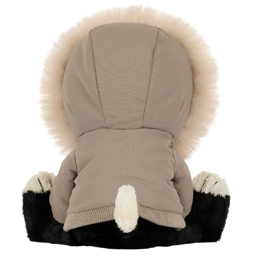 Back view of a Jellycat Jack ‘Alpine’ plush toy wearing a hooded parka with a faux fur trim, sitting with its paws and tail visible.