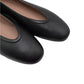 Close-up of Casa Isota's Dafne Leather Flats, crafted from black Nappa leather with rounded toes by Italian artisans, shown on a white background.