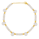 Introducing the Jia Jia Ocean Pearl Gold Bead Bracelet, a stunning piece by Jia Jia. Handmade in NYC, this bracelet features lustrous freshwater pearls and 14 karat gold beads. The design highlights alternating sizes of pearls complemented by delicate gold accents, all secured with a stylish clasp.