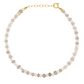 The Jia Jia Birthstone Bracelet by Jia Jia features small round beads in elegant shades of white and gray, complemented by semi-precious gemstones, and is finished with a 14-karat gold clasp and extension chain.