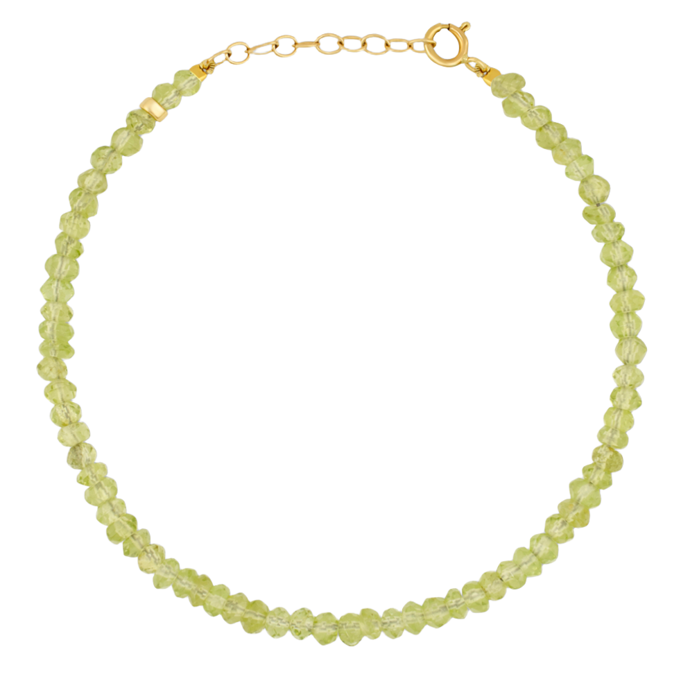 Introducing the Jia Jia Birthstone Bracelet by Jia Jia, a green beaded bracelet adorned with semi-precious gemstones, featuring a 14-karat gold clasp and an adjustable chain.