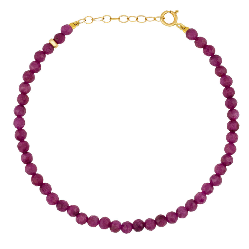 The Jia Jia Birthstone Bracelet by Jia Jia, featuring semi-precious gemstones and a 14-karat gold chain and clasp, is displayed in a circular shape against a white background.