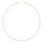 Introducing the Jia Jia Birthstone Necklace by Jia Jia: a refined necklace featuring white beads and a 14 karat gold clasp, ideal for those who appreciate understated elegance.