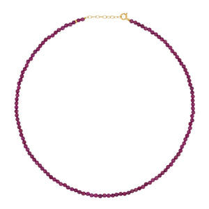 The Jia Jia Birthstone Necklace by the brand Jia Jia is a delicate necklace featuring purple beads and a 14 karat gold clasp.