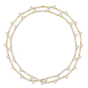 The Jia Jia Ocean Pearl Gold Bead Double Long Necklace, by the brand Jia Jia, showcases elegant freshwater pearls and 14 karat gold beads against a pristine white background.