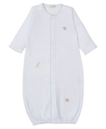 The Kissy Kissy Baby Boys' Jungle Mates Convertible Gown is a white baby sleeper made from soft Peruvian cotton, featuring jungle animal embroidery with a grey elephant, yellow giraffe, and brown lion. It offers convenience with its convertible design, closed bottom, long sleeves, and front seam detailing.