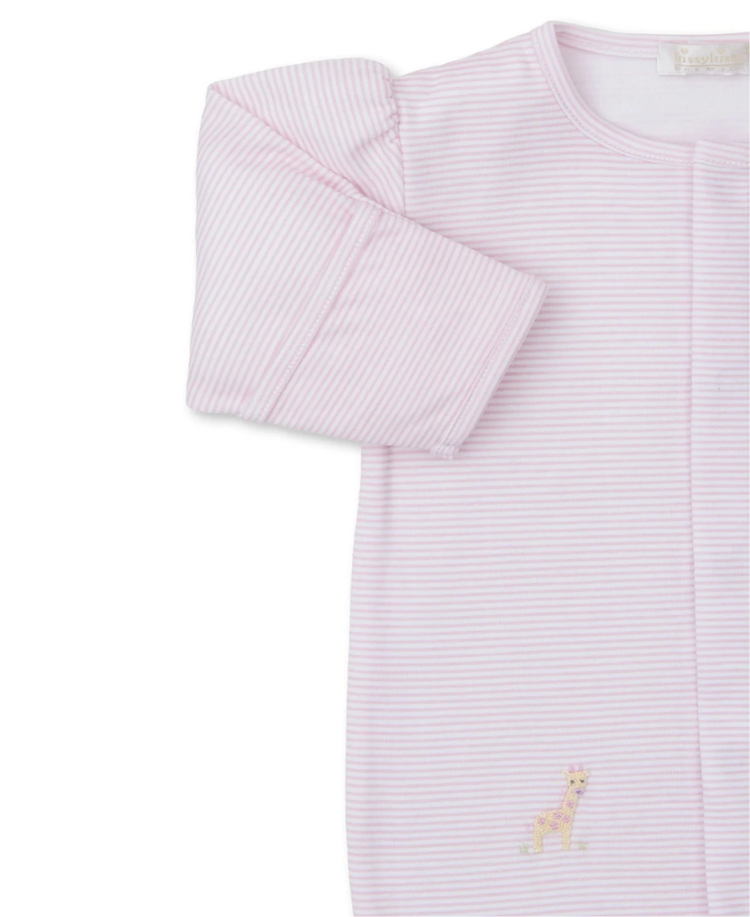 A cozy Kissy Kissy Jungle Mates Striped Hand Emb. Footie, crafted from soft Peruvian cotton in pink and white stripes with long sleeves, and featuring a small giraffe illustration near the bottom edge, creates the perfect baby ensemble.