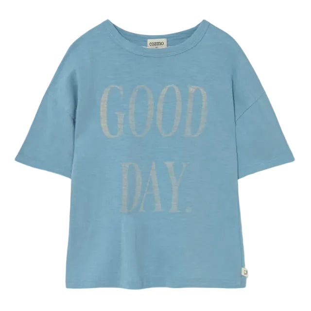 The Cozmo Boys' Good Day T-Shirt is a light blue slub cotton tee featuring "GOOD DAY." in large, light-colored letters on the front—short sleeves and lightweight comfort make it perfect for everyday wear.