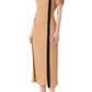 A person in a beige Draped Neck Fluid Crepe Dress by Jason Wu Collection, featuring a black diagonal stripe, short sleeves, and knee-length slit, stands elegantly in black heels against a white background.