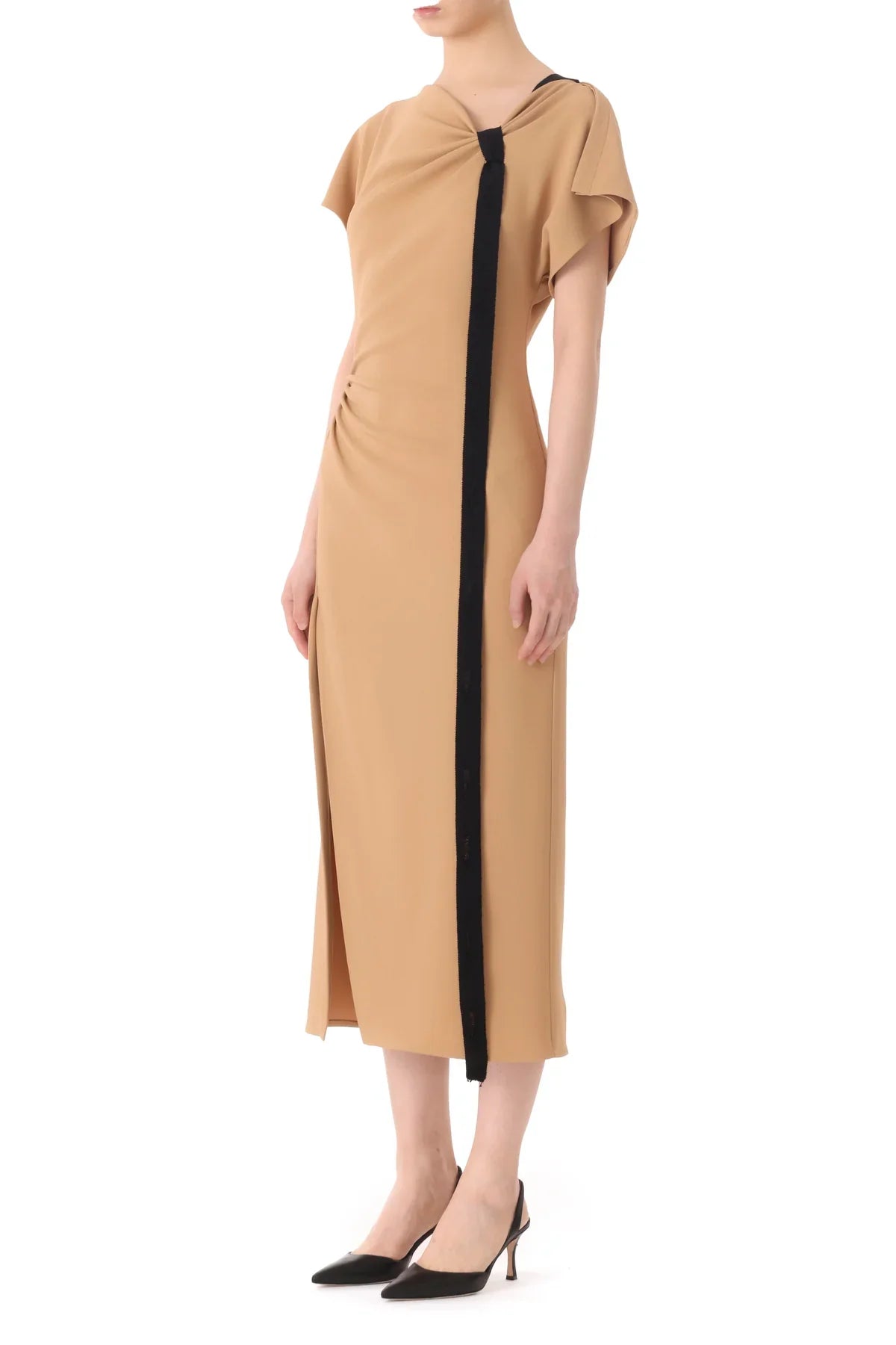 Person wearing a beige midi dress with short sleeves and a black vertical stripe, paired with black heels. This Jason Wu Collection Draped Neck Fluid Crepe Dress exudes sophistication and style.