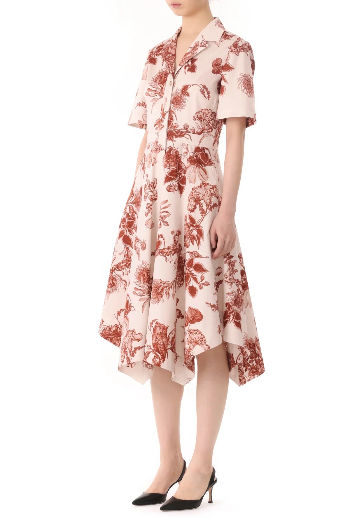 A person wearing a Jason Wu Collection Forest Floral Shirtdress with black heels, standing against a plain white background.