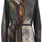 The Brushstroke Printed Oversized Shirtdress by Jason Wu Collection features an abstract print in earthy tones, a collar, a button-down front, and a waist belt for added definition.