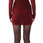 A person wearing the Jason Wu LS Double Layer Ruched Dress and black stockings stands with their back to the camera against a white background.