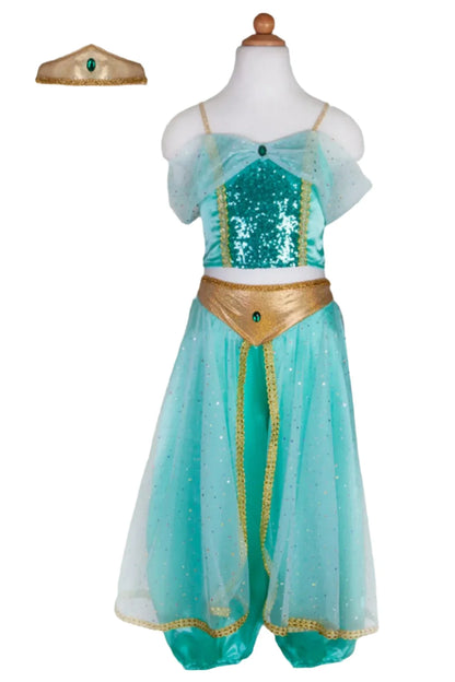 The Great Pretenders Jasmine Princess Set features a child’s turquoise and gold costume with a sequin bodice, tulle skirt, and matching headband. Displayed on a dress form, this premium set is inspired by a classic Jasmine pant set and adorned with faux emerald gemstones for added sparkle.