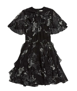 The Jason Wu Collection SS Printed Chiffon Dress from Jason Wu Collection features a sophisticated black print, short ruffled sleeves, an elegant ruffle detail on the chest, and a flared skirt.