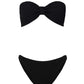 The Jean Bikini by Hunza G features a stylish black bandeau top crafted from signature crinkle fabric with a gathered center detail, paired with classic-cut bottoms for a timeless silhouette. Designed as one size swimwear, this piece comfortably flatters a range of body shapes.