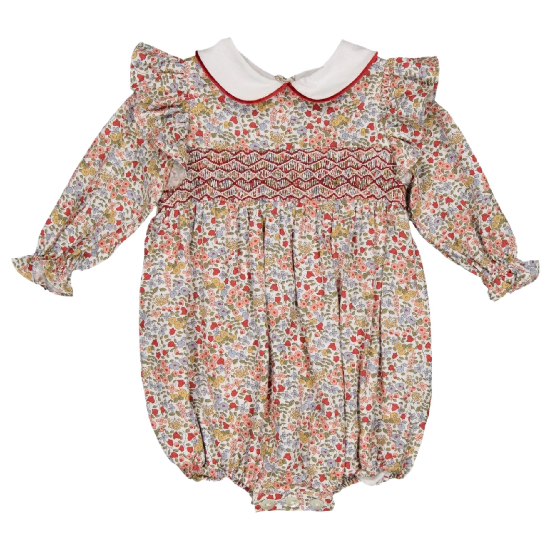 Introducing the Kidiwi Julyne Long-Sleeve Baby Romper by Kidiwi: a charming floral baby girl romper made from 100% cotton, featuring a delightful white Peter Pan collar, intricate red and white smocked stitching, and cute ruffled shoulders.