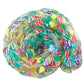 Introducing Crazy Aaron's Hide Inside Thinking Putty by Crazy Aarons: a clear, coiled putty made from non-toxic silicone, featuring an array of colorful, small charms and shapes inside. Perfect for sensory integration and endless fun!