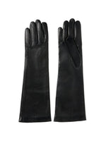 A pair of Kallmeyer Park Leather Gloves—handmade in Italy from black leather with extended cuffs and a silk lining for extra comfort—are shown laid flat on a white background.
