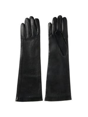 A pair of Kallmeyer Park Leather Gloves—handmade in Italy from black leather with extended cuffs and a silk lining for extra comfort—are shown laid flat on a white background.