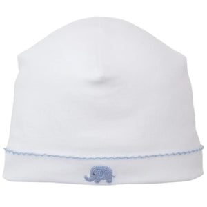 The Kissy Kissy Safari Wild Hand Emb. Hat is a white Peruvian cotton baby hat with a blue hand-embroidered elephant and blue stitched trim.