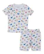 The Kissy Kissy Baby and Kids' Ocean Antics Short Sleeve PJ Set showcases a delightful ocean-themed print with vibrant crabs, fish, turtles, and whales on a clean white background. Crafted from ultra-soft Pima cotton, these pajamas are as cozy as they are charming for your little one.