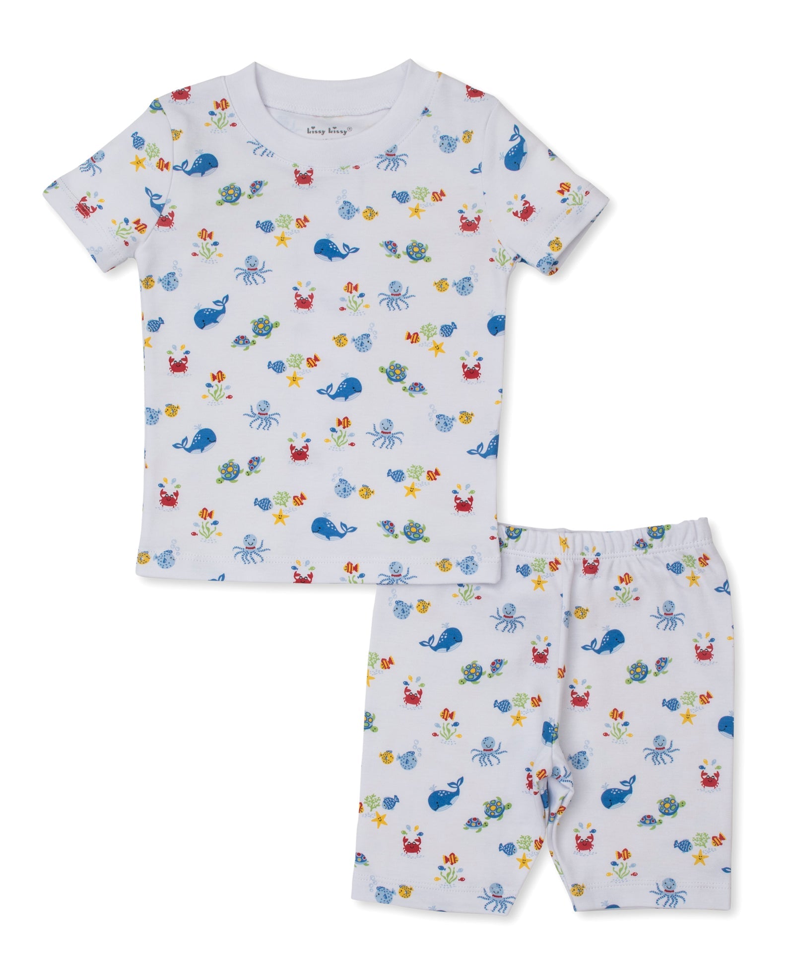 The Kissy Kissy Baby and Kids' Ocean Antics Short Sleeve PJ Set showcases a delightful ocean-themed print with vibrant crabs, fish, turtles, and whales on a clean white background. Crafted from ultra-soft Pima cotton, these pajamas are as cozy as they are charming for your little one.