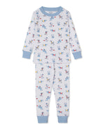 The Kissy Kissy Baby Boys’ and Boys’ Pajama Set is a soft pima cotton long-sleeve pajama set featuring light blue cuffs and collar, decorated with an all-over print of colorful dogs in sweaters on a white background.