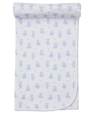The Kissy Kissy Teddy Bear Time Printed Blanket is a white Pima cotton baby blanket featuring a small blue teddy bear pattern and blue edging, shown partially rolled at the top.