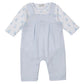 The Kissy Kissy Baby Teddy Bear Time Overall Set features light blue overalls with straps, front buttons, pleats, and a white long-sleeve pima cotton bodysuit decorated with a cute teddy bear print.