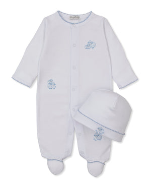 Kissy Kissy Baby Sweet Sheep Footie with Hat Set in white, featuring long sleeves, delicate blue sheep prints, soft blue trim, and a matching white hat. Both pieces are crafted from luxurious Pima cotton for extra comfort and laid flat on a white background.