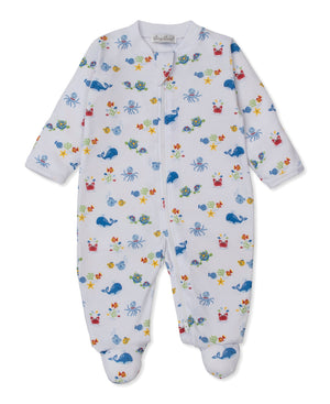 The Kissy Kissy Baby Ocean Antics Zip Footie is crafted from white Pima cotton and features colorful ocean-themed prints—whales, crabs, turtles, and starfish—with a convenient front zipper closure.