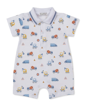 The Kissy Kissy Baby Boys’ Construction Roadwork Short Playsuit is a short-sleeve romper with a collar, crafted from soft Pima cotton and adorned with a playful construction-theme print featuring vehicles, cones, and caution signs in blue, orange, and yellow on a white background.