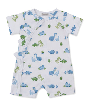 The Kissy Kissy Baby Boys' Dinosaur Delight Short Playsuit is a soft Pima cotton romper in white, featuring a playful blue and green dinosaur print, convenient side snap buttons, and fun decorative fabric spikes along one side.