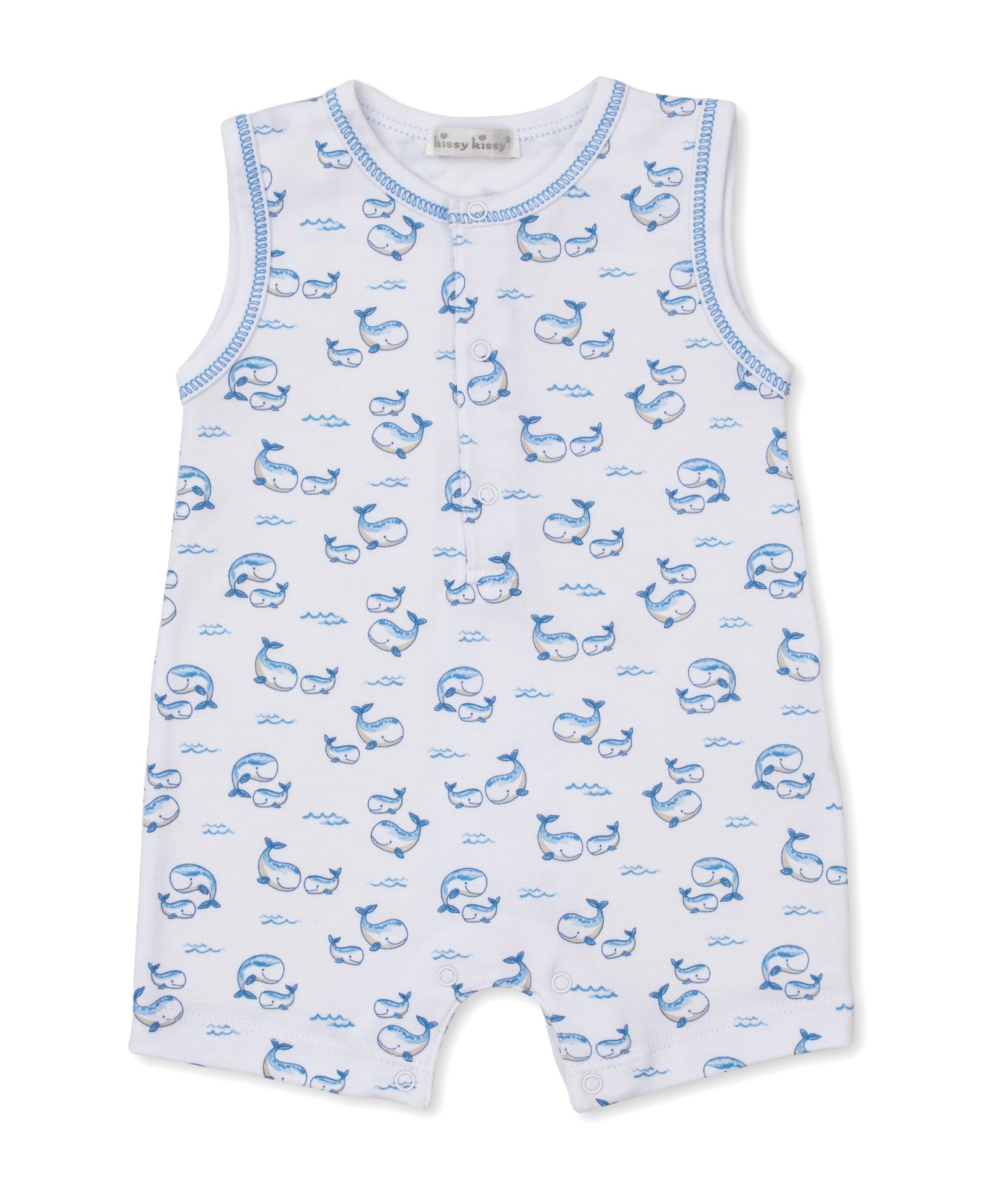 Kissy Kissy Baby Boys’ Whale Pods Sleeveless Playsuit crafted from soft Pima cotton features a charming blue whale and wave pattern on white fabric, with front buttons and blue trim around the arm and neck openings—an adorable choice for summertime adventures.