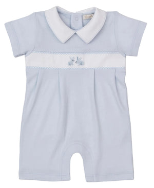 The Kissy Kissy Baby Boys' Premier Springtime Bunny Fun Hand Emb. Playsuit is a light blue short-sleeve Peruvian cotton outfit with a white collar, chest panel, and a hand-embroidered bunny on the front.