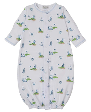 The Kissy Kissy Baby Golf Championship Convertible Gown is a white Pima cotton gown with blue trim, snap buttons, gathered cuffs, and an all-over golf-themed print featuring cartoon animals, cars, and green patches.