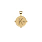 The Jane Win Letter Pendant Satellite Necklace Collection features a textured 14k gold pendant with a raised "K" and star, perfectly paired with a beaded satellite chain.