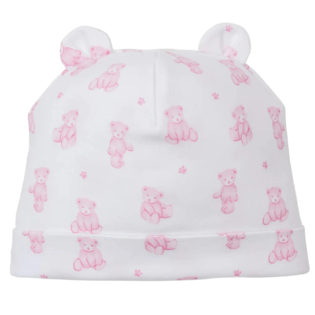The Kissy Kissy Teddy Bear Time Novelty Printed Hat is made from soft Pima cotton, featuring small pink teddy bear prints and two rounded fabric ears on top.
