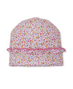 The Baby Girls’ Blossom Bows Ruffle Hat by Kissy Kissy is crafted from soft Pima cotton and features a delicate pink, orange, and green floral print with a charming pink ruffle trim, displayed on a white background.