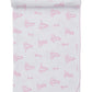 The Kissy Kissy Giraffe Grace Blanket is a white Pima cotton baby blanket featuring pink giraffe and girl illustrations, rolled at the top edge and finished with light pink stitched trim.