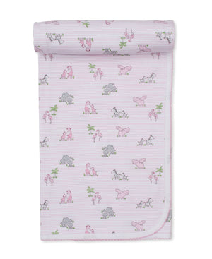 The Kissy Kissy Safari Party Blanket is crafted from ultra-soft Pima cotton in light pink, featuring delicate printed illustrations of hippos, flamingos, zebras, and palm trees with a thin striped pattern and rounded corners.