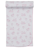 The Kissy Kissy Springtime Bunny Fun Blanket is a white Pima cotton baby blanket with pink edging and a repeating pattern of pink-outlined bunnies and small trees, shown partially rolled at the top.
