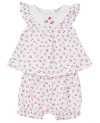 The Kissy Kissy Baby Girls' Sea Shell Magic Sunsuit Set features a white Pima cotton outfit with ruffled sleeves, decorated in colorful seashell and starfish prints; includes a matching top and bloomers.