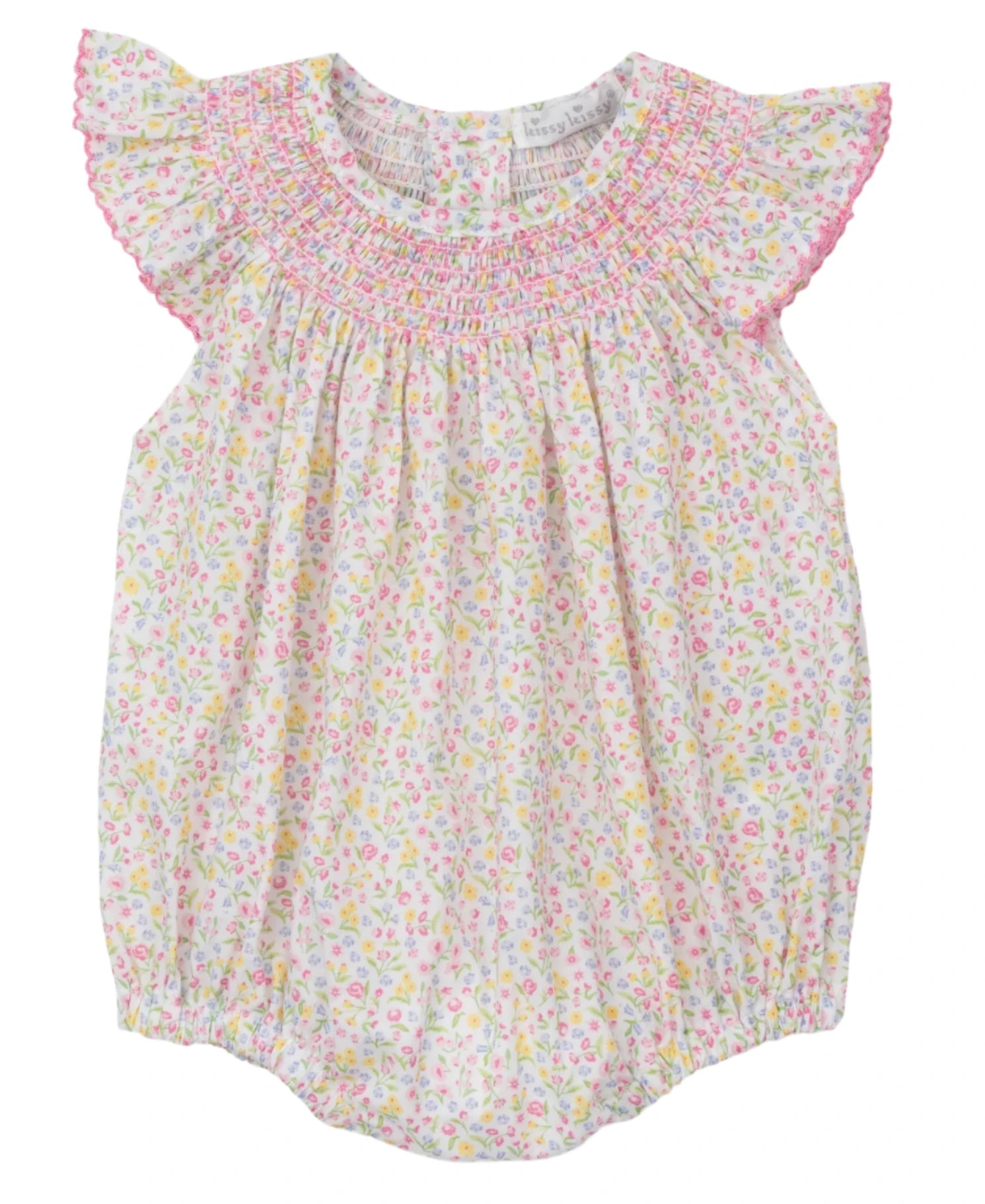 The Kissy Kissy Garden Trellis Floral Smocked Woven Bubble is a baby romper made from soft Pima cotton, featuring ruffled sleeves and delicate smocking at the neckline, adorned with pink, yellow, and green flowers on a white background.